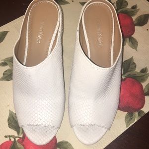 White slip on Calvin Klein heels